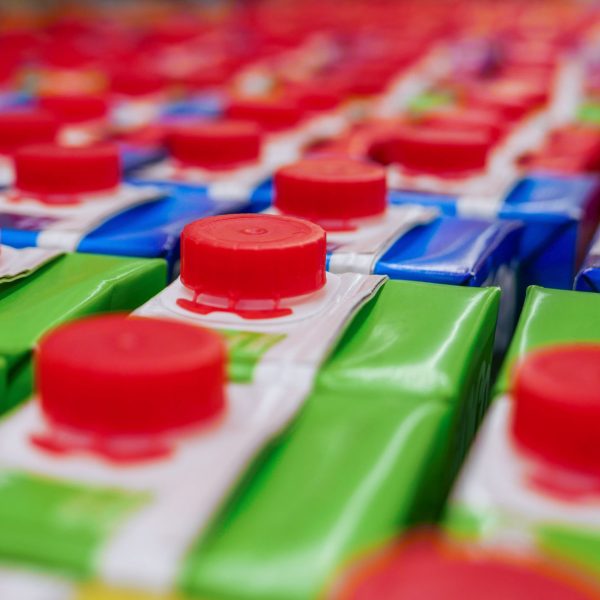 stock-photo-colorful-juice-cartons-with-red-screw-cap-in-supermarket-shelf-668117407 stock-photo-colorful-juice-cartons-with-red-screw-cap-in-supermarket-shelf-668117407