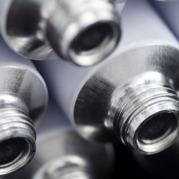 stock-photo-macro-of-a-group-of-new-compressible-aluminum-tubes-for-a-pharmacological-and-beauty-industry-756356317 stock-photo-macro-of-a-group-of-new-compressible-aluminum-tubes-for-a-pharmacological-and-beauty-industry-756356317